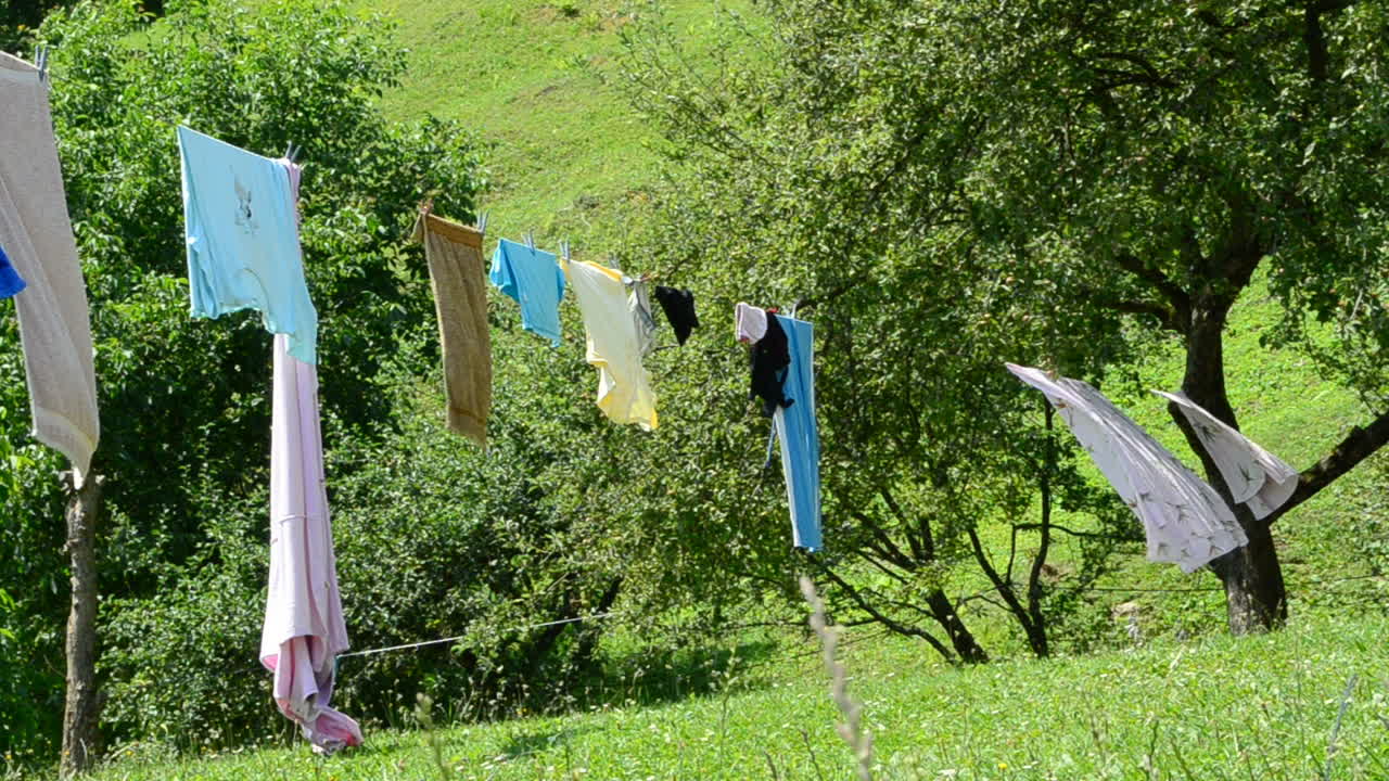 Linen in the yard. Linen against mountains