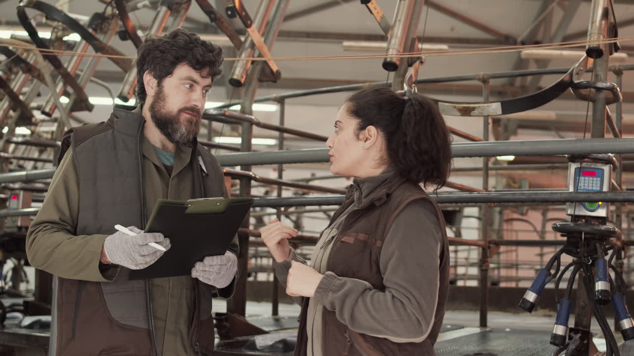 Diverse Workers Talking in Industrial Premises