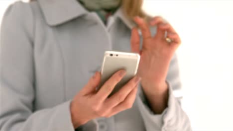 Woman-using-her-smartphone