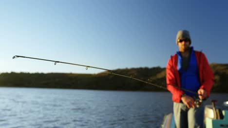 man fishing in river 4k