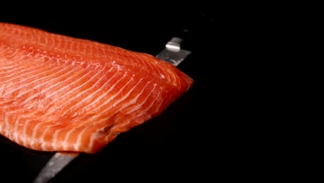 chef preparing salmon sashimi