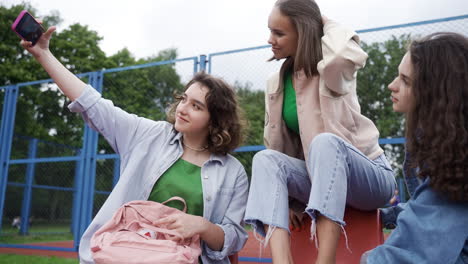 friends talking in the schoolyard