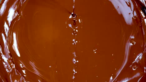 chocolate melting and swirling in close-up view