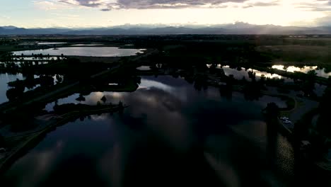 glorious mountain sunset with reflections in lakes and ponds