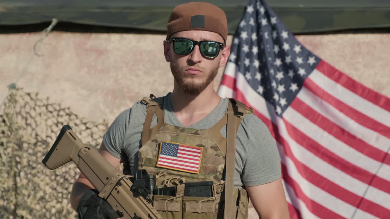 Military Man In Camouflage Vest With Sniper Rifle