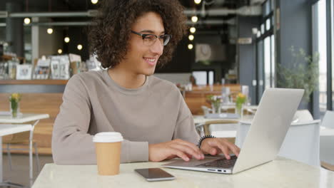 man using laptop 4k