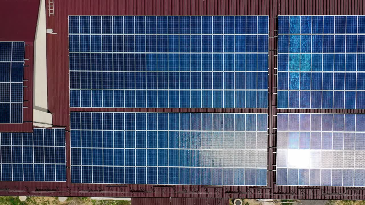 Solar panel reflecting the sun. Phototovoltaic panels on the roof with sunlight