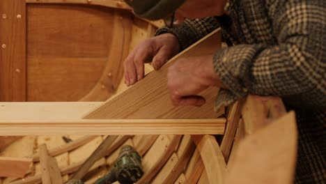 boatbuilding, fitting oak knee in wooden boat frame