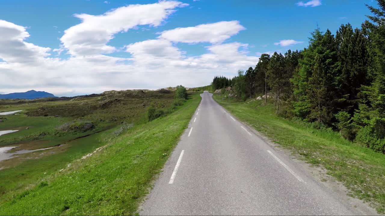 Driving a Car on a Road in Norway