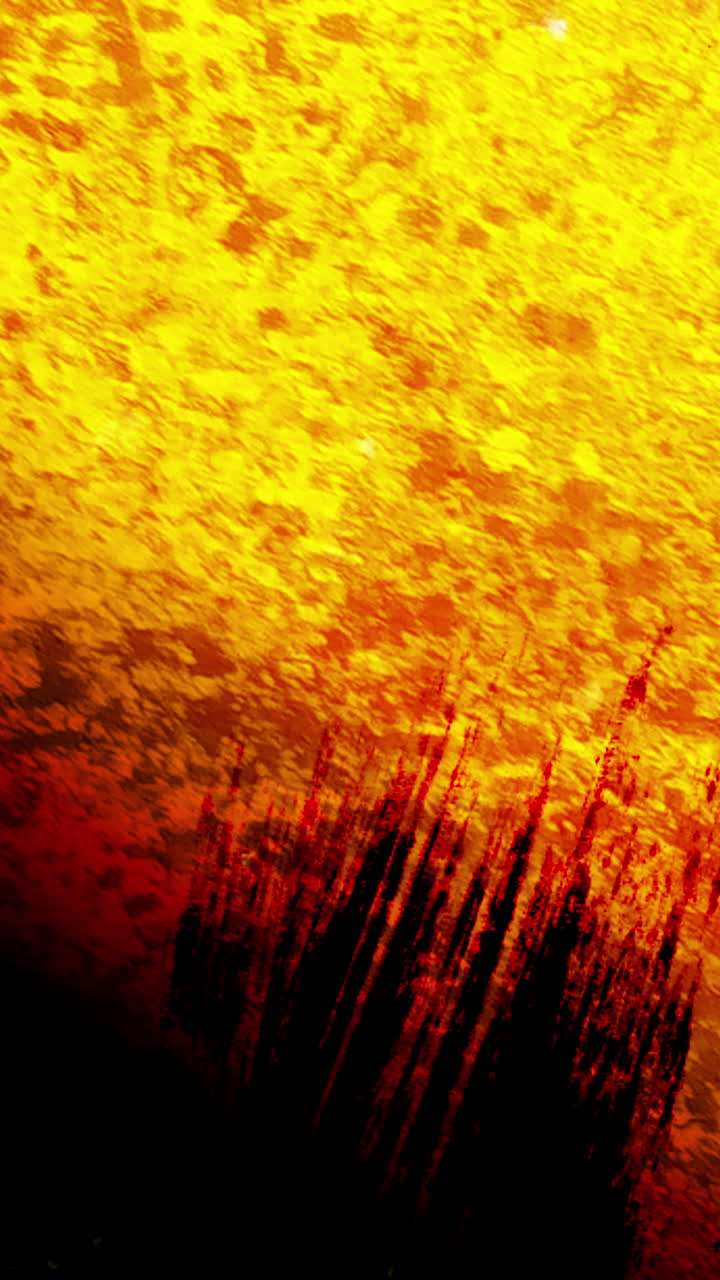 Dynamischer abstrakter Hintergrund mit feurigen Rot- und Gelbtönen.