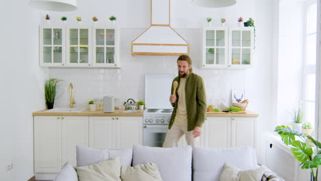 man singing in the kitchen