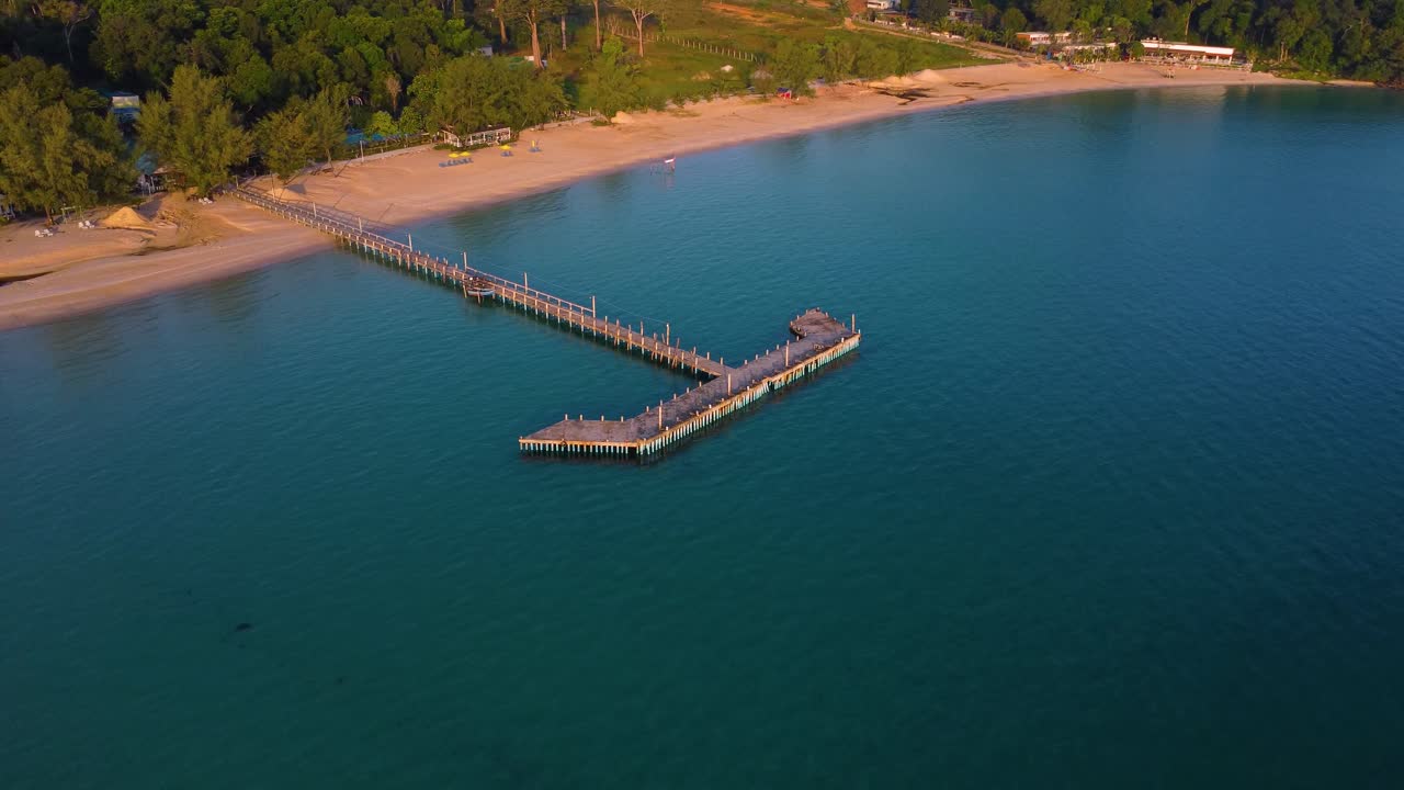 Dock pier exotic tropical island ocean aerial view, nature landscape virgin beach