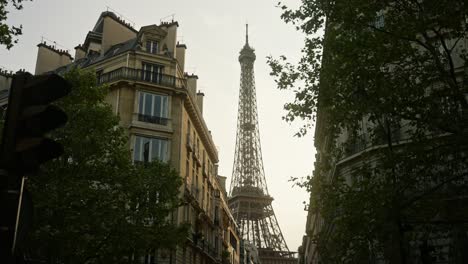 eiffel tower viewed from parisian street