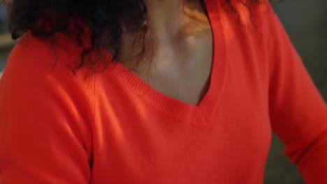 Front-view-of-American-African-female-fashion-designer-working-on-computer-at-desk-in-office-4k