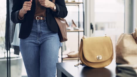 woman, shopping and choice in handbag boutique