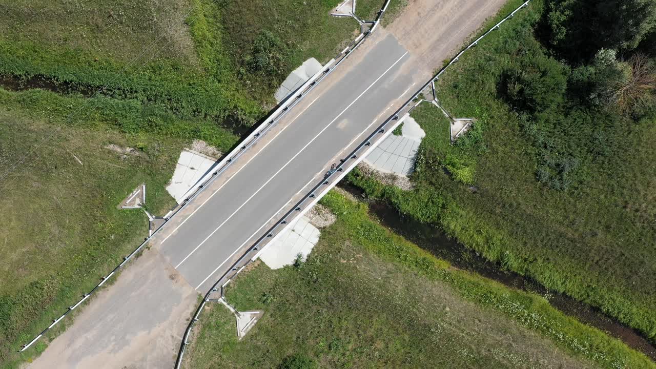 Aerial View of a Rural Road Bridge Over a Stream