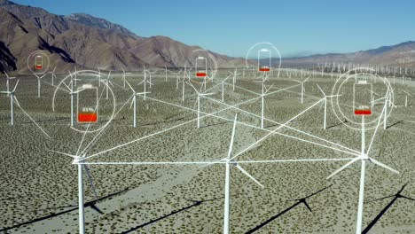 grid lines connecting windmill turbines while batteries are charging over in california desert