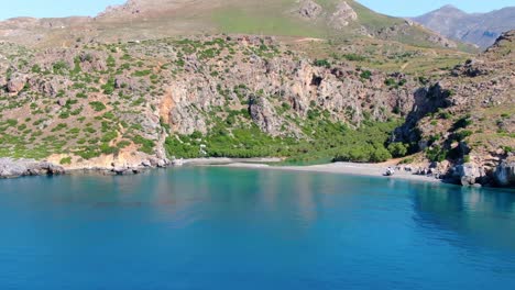 aerial drone shot of a natural lagoon and tributary waterway on the island of crete greece