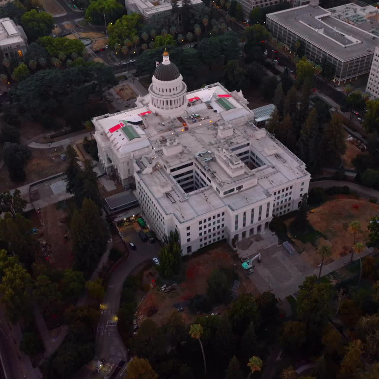 Stunning building of California State Capitol in Sacramento, USA. Aerial view of the establishment surrounded by beautiful green park