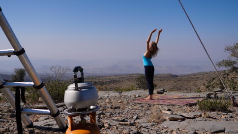 Western-traveler-girl-practicing-outdoor-yoga-in-Oman,-different-poses-in-other-clips-available