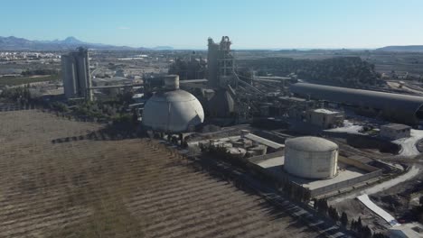 orbiting around a huge cement manufacturing plant. san vicente del raspeig, spain.