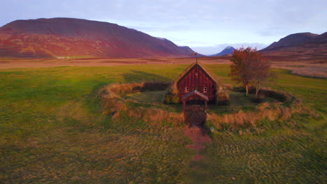 grafarkirkja peat-roofed oldest church in iceland at sunset