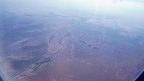 paisaje desde la ventana del avión que vuela de australia a singapur - aéreo, punto de vista