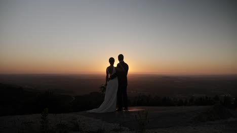 Zoom-out-of-a-fresh-married-couple-in-the-sunset