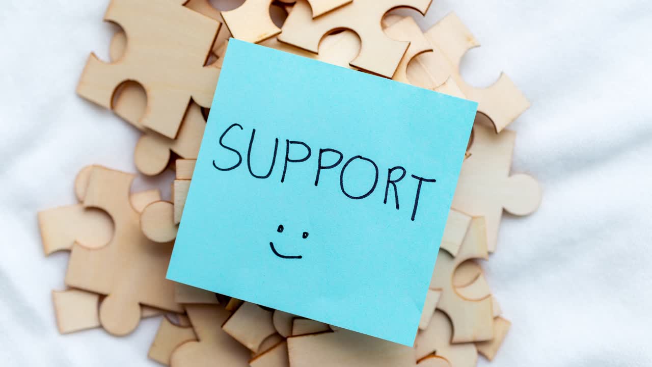 Exploring the importance of support in teamwork with puzzle pieces symbolizing unity.