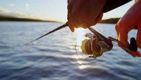 man fishing in river 4k