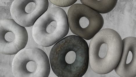 abstract stone rings on a grey background