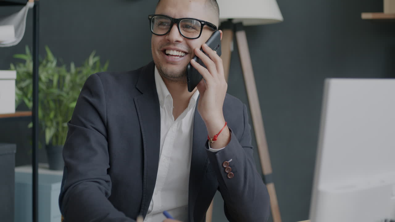 Businessman on Phone in Office