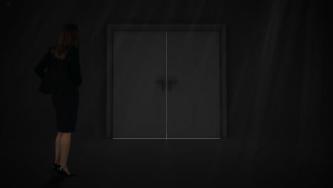 Door opening to green screen watched by businesswoman