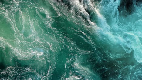 Blue-waves-of-water-of-the-river-and-the-sea-meet-each-other-during-high-tide-and-low-tide.