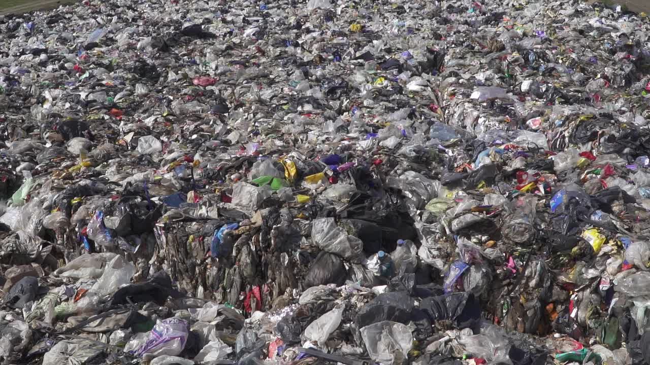 Zoom in on plastic waste in a dumping ground
