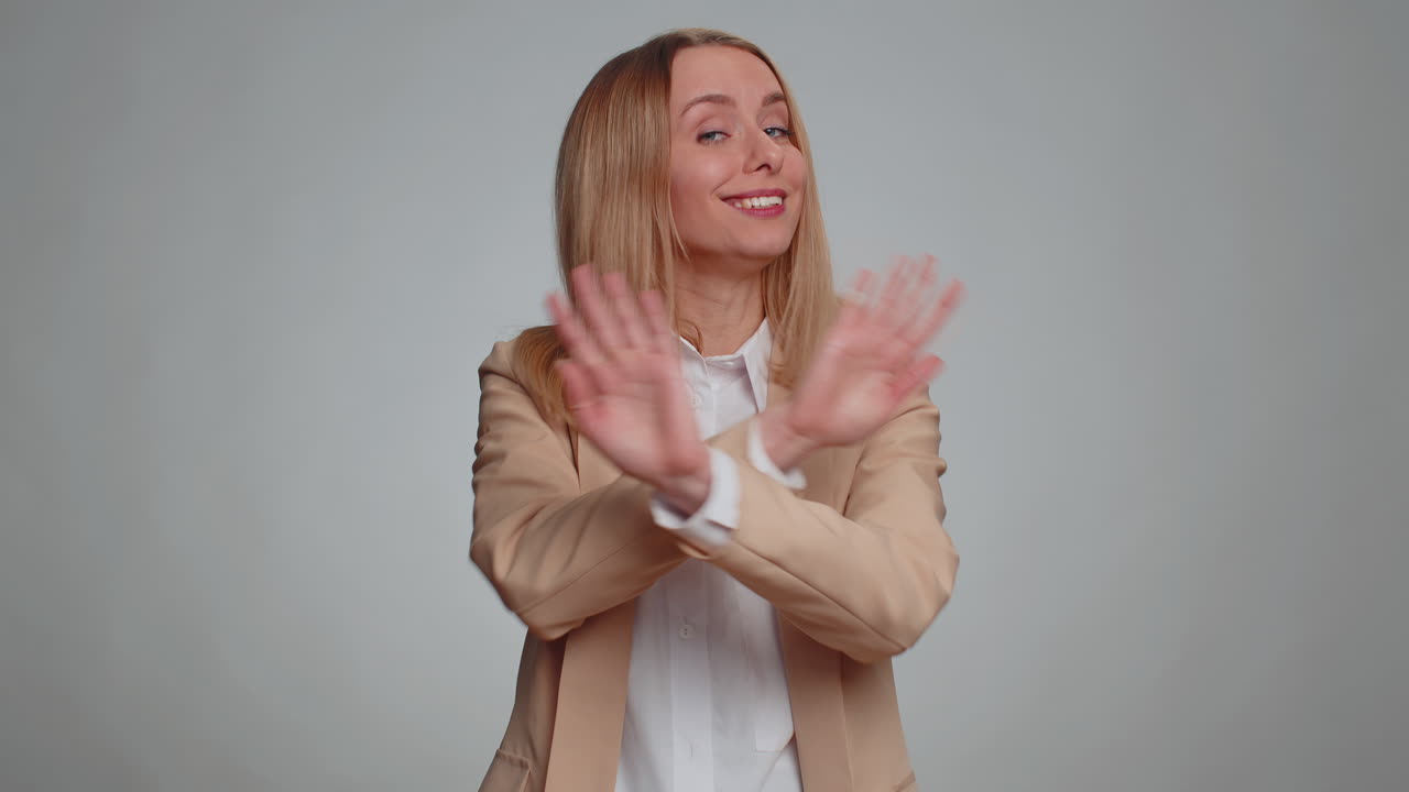 Afraid business woman closing eyes with hand showing stop gesture confused shy scared to watch awful