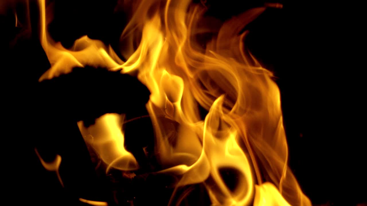 Burning fire. Fire flames on black background. Slow motion