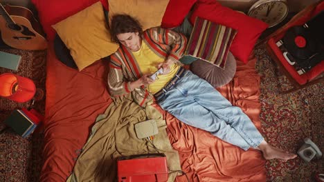 retro gamer in a cozy bedroom