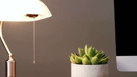 Close-up-of-illuminated-table-lamp