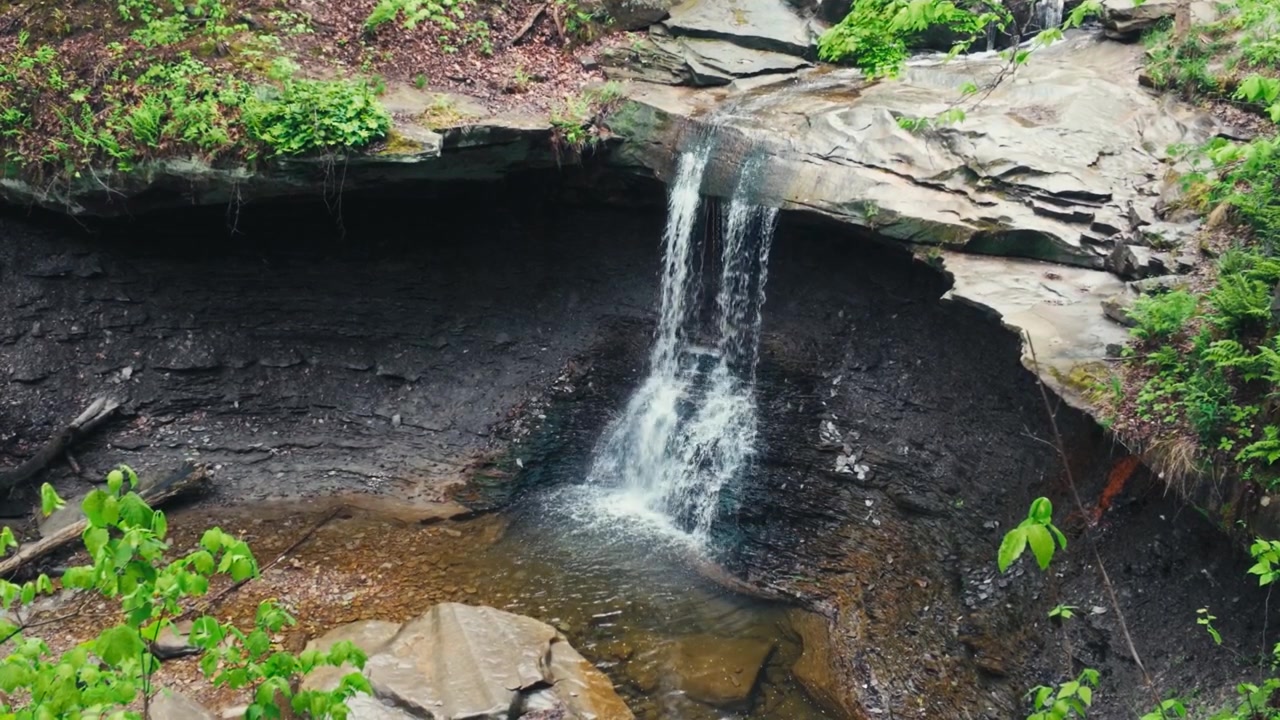 A waterfall flowing over stone at Cuyahoga Valley National Park in Ohio.