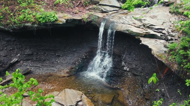 A waterfall flowing over stone at Cuyahoga Valley National Park in Ohio.