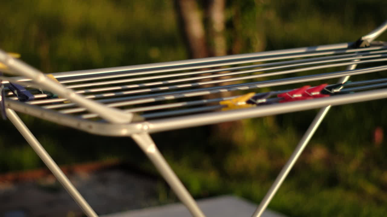 Summer Clothesline with Colorful Garments in Sunlight