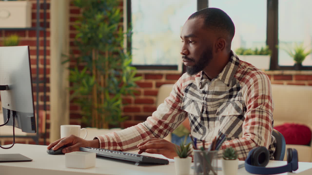 Professional worker analyzing online startup data on computer