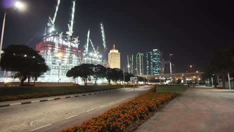 night view of modern construction site in dubai