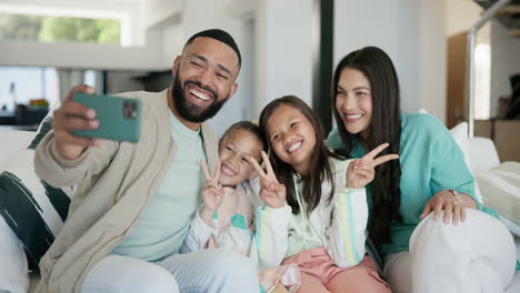 Parents,-children-and-selfie-on-sofa-in-family