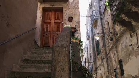 Matera,-Itlay-looking-up-stairwell-to-home