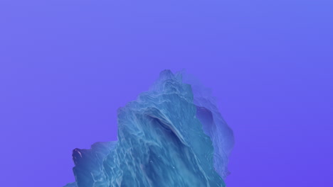 Jagged-blue-iceberg-floating-alone-in-the-ocean