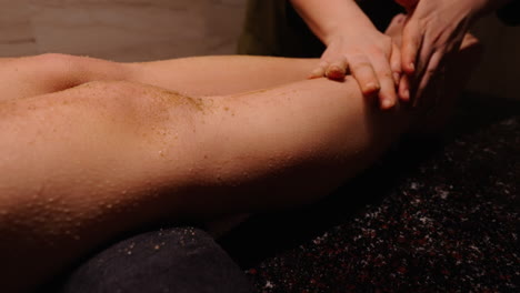 leg massage with body scrub