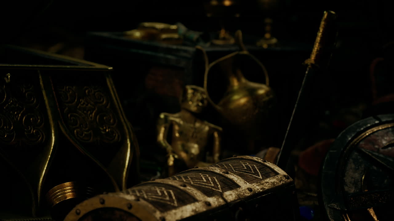 어 ⁇  속에서 보석과 금 동전을