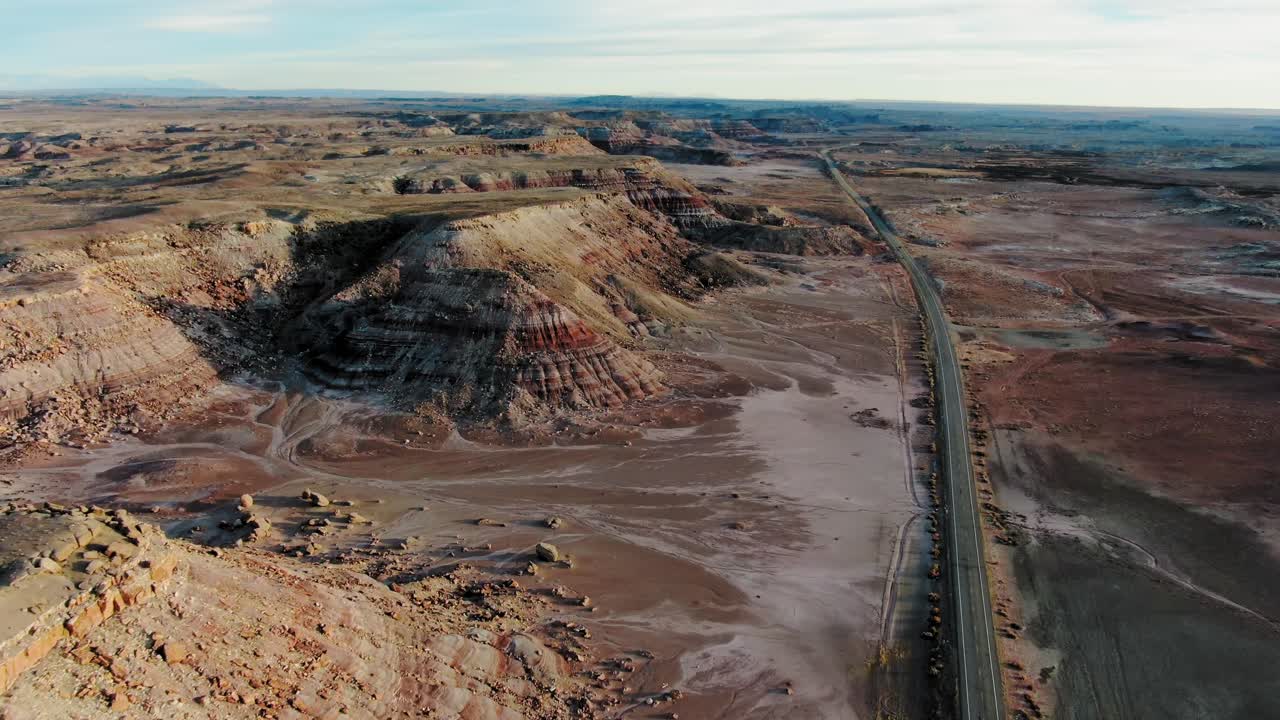 Aerial Shot Over Highway In Arid Navajo Desert Landscape, Utah - USA